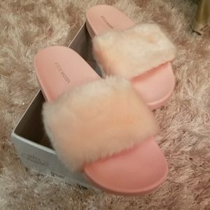 Pink Steve Madden slides